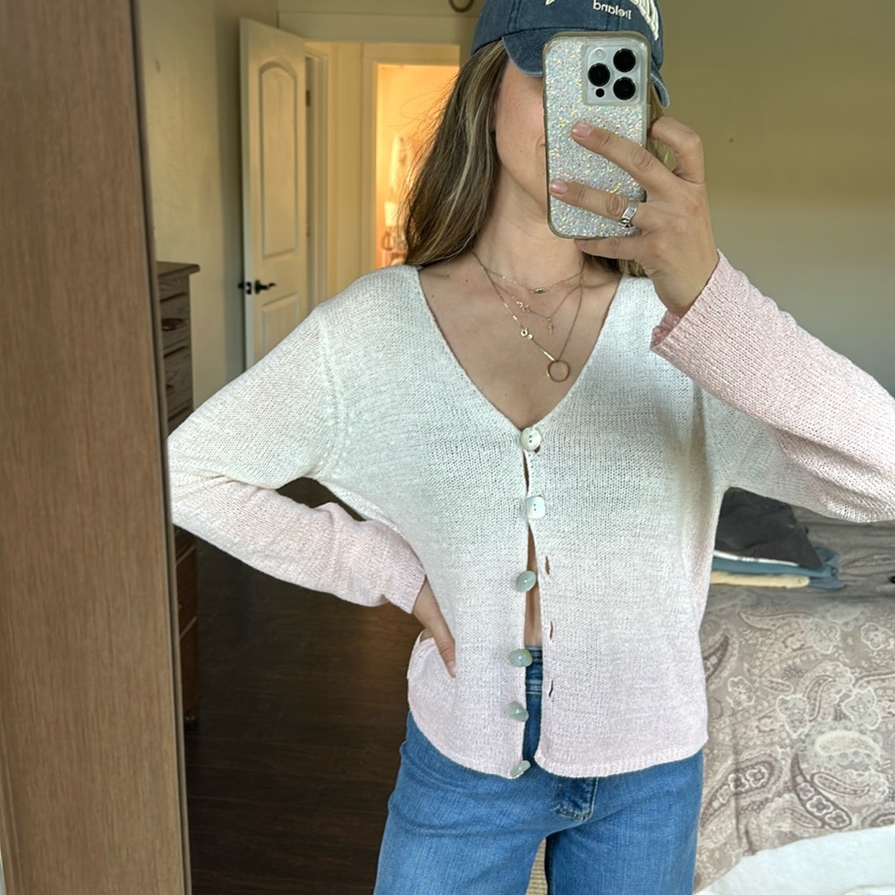 Knit cardigan with shell buttons